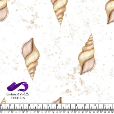 Seashell pattern on a light speckled background textile design