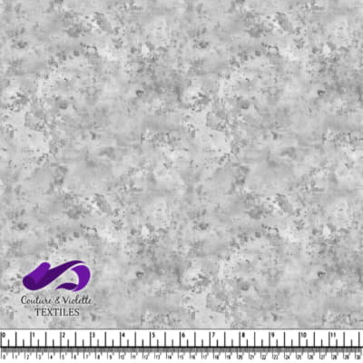 Gray textured fabric background with mottled pattern