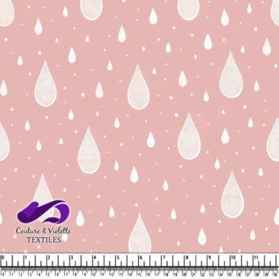 Pink fabric pattern with white raindrops and dots