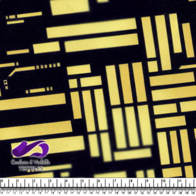 Close up of metal with various sized rectangular cutouts