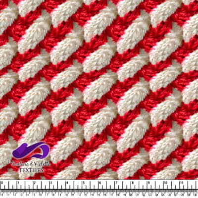 Close up of red and white textured knitted fabric