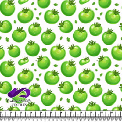 Fresh green tomatoes with basil leaves and drops