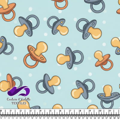 Baby Pacifier Pattern on Blue Background