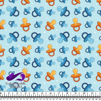 Baby Pacifiers Pattern on Blue Background